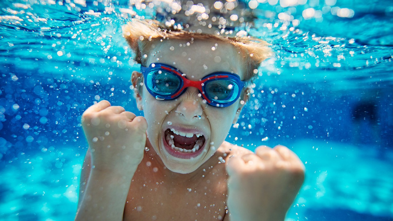 Boy underwater; imaged used for HSBC Philippines Red Mastercard Credit Card page 